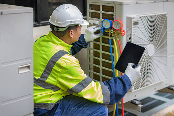 Professional Hvac Maintenance technician working in Oak Island, NC